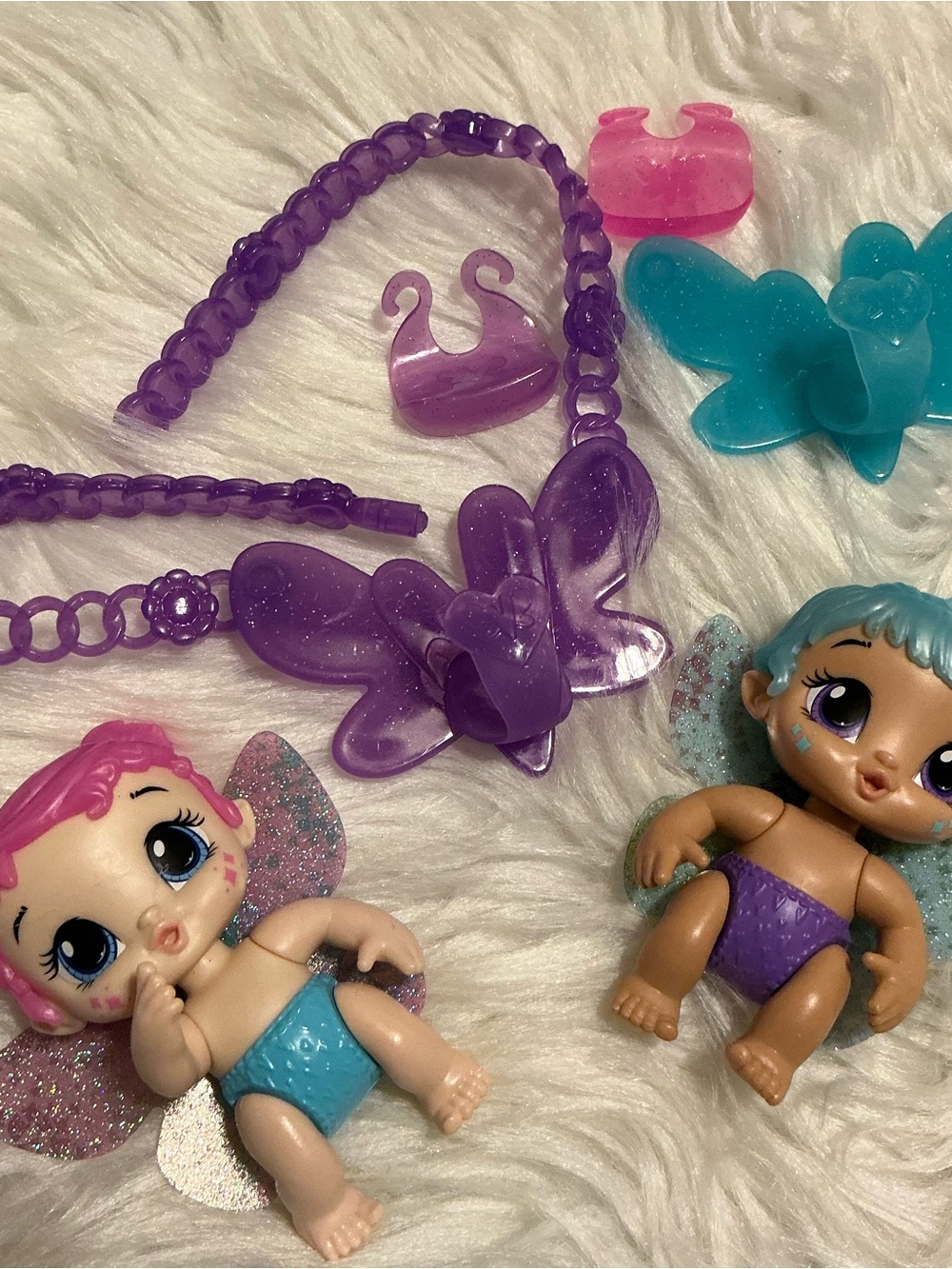 Lot of 2 Baby Alive Glo Pixies Mini Carry and Care dolls +2 bibs & necklace